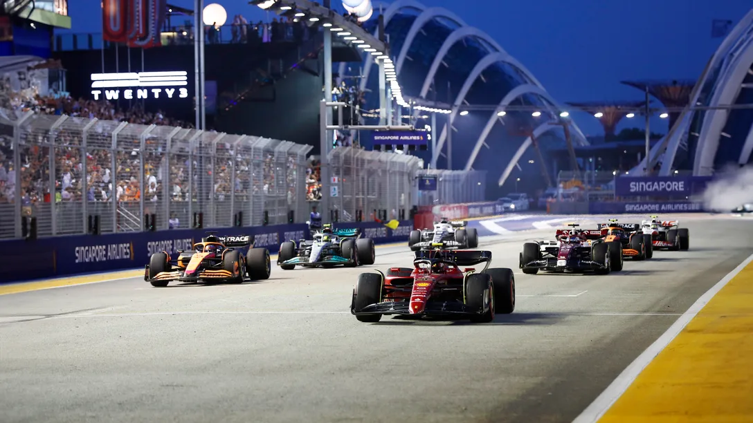 Ext F1 cars roaring down the Pit Straight during a session over the race weekend